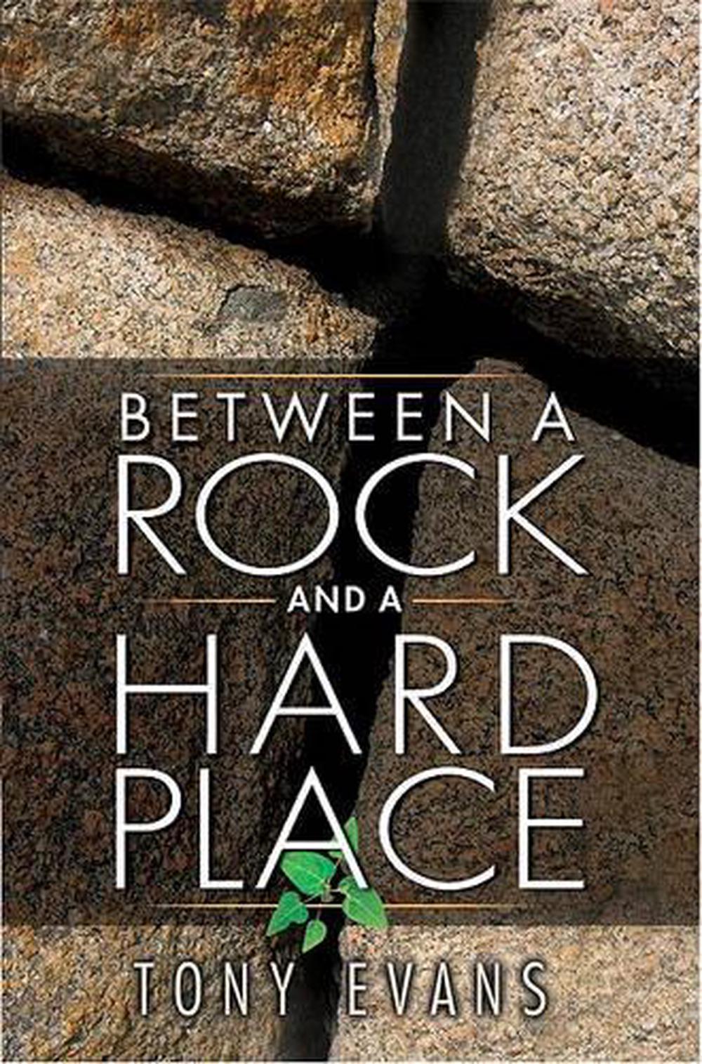 Love Divided Between A Rock And A Hard Place Between a Rock and a Hard Place by Tony Evans (English) Paperback Book