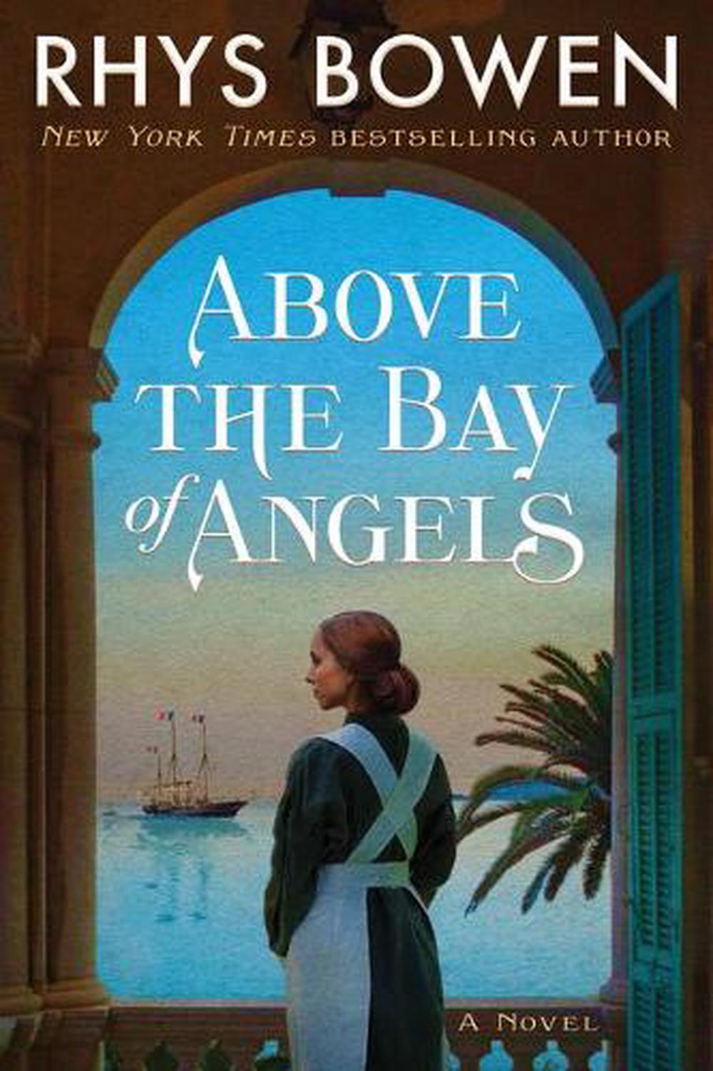 Above the Bay of Angels A Novel by Rhys Bowen (English) Paperback Book